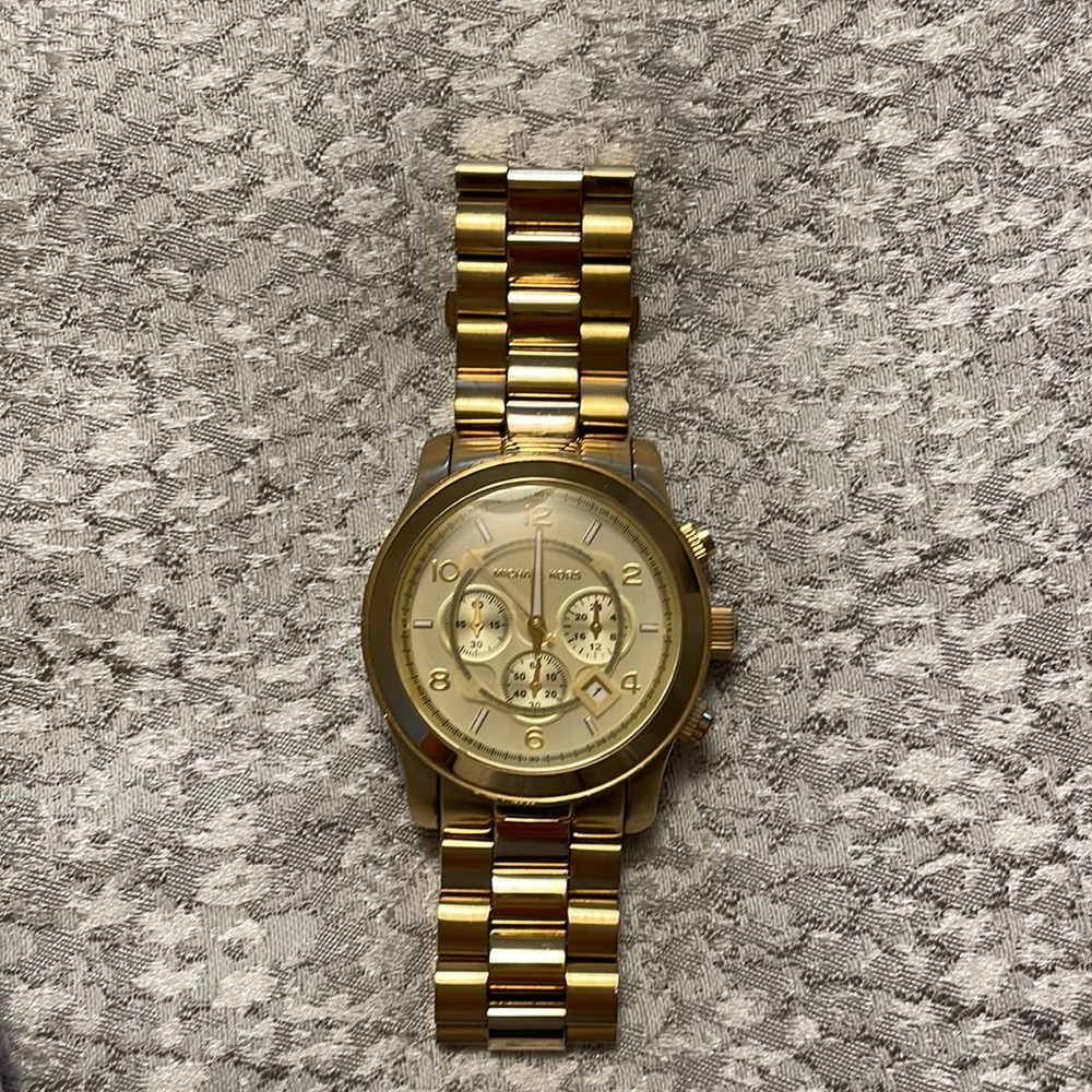 MK gold runway watch (needs new battery)